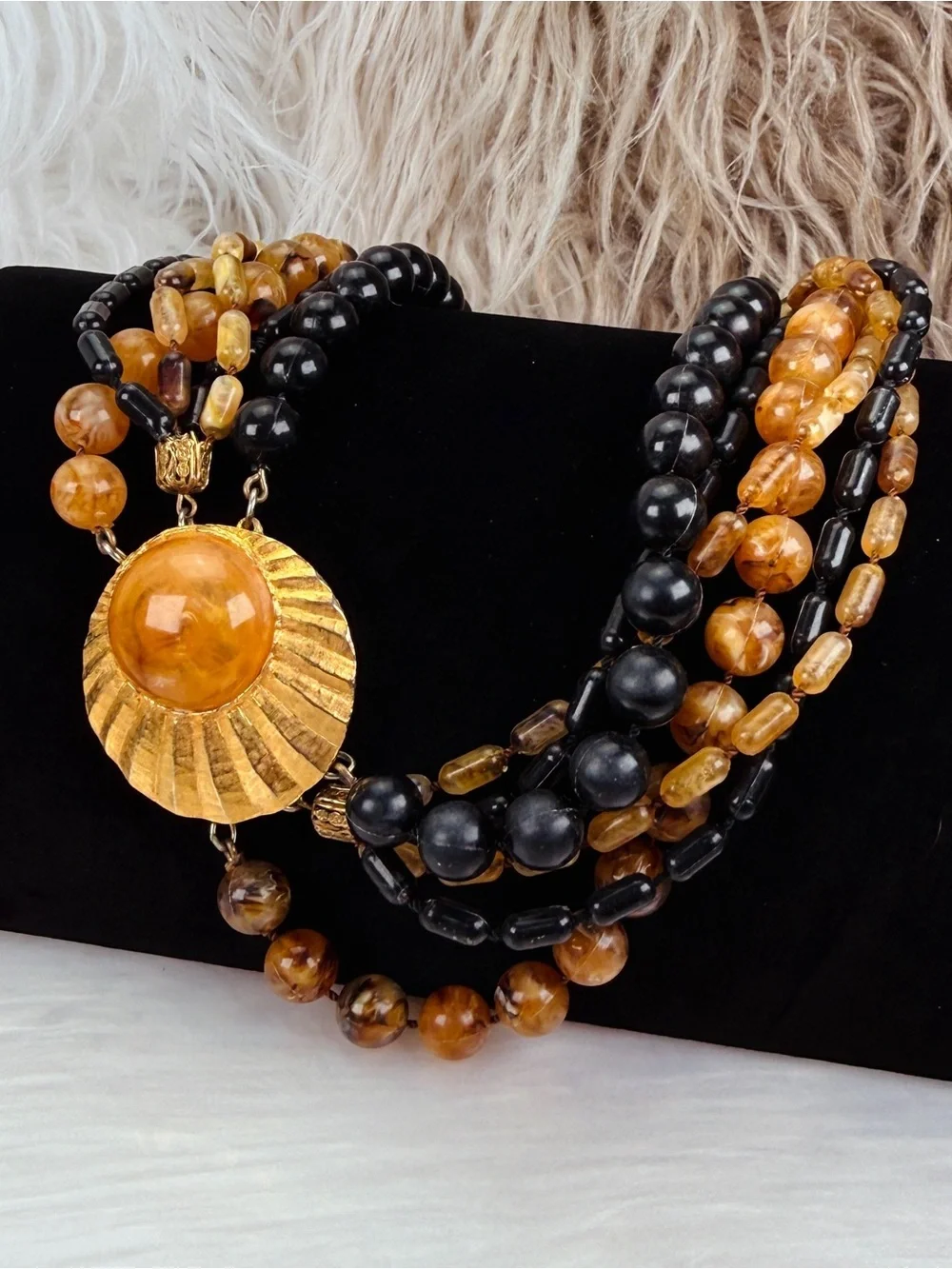 Vintage Multi Strand Black Amber Tone Bead Necklace Gold Tone Centerpiece